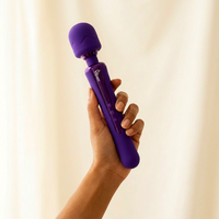 Hand holding Viben Obsession Wand — Afterglow Co. lifestyle
